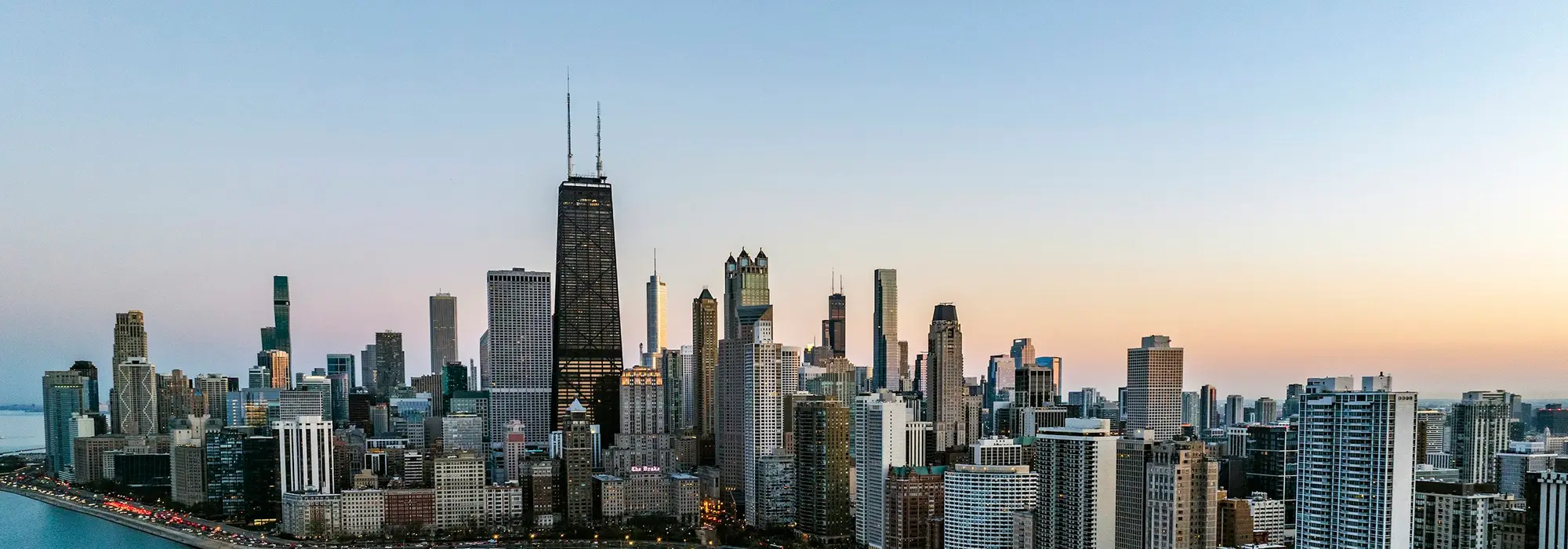 The Chicago skyline along the lakefront at dusk